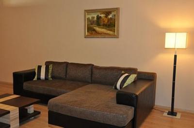 Sonderangebot für Appartements in Cserkeszolo Aqua Spa Apartment - Wohnzimmer mit Sofa   - ✔️ Appartement Aqua Spa**** Cserkeszolo - Luxus Appartements in Aqua Spa Cserkeszolo für Familien